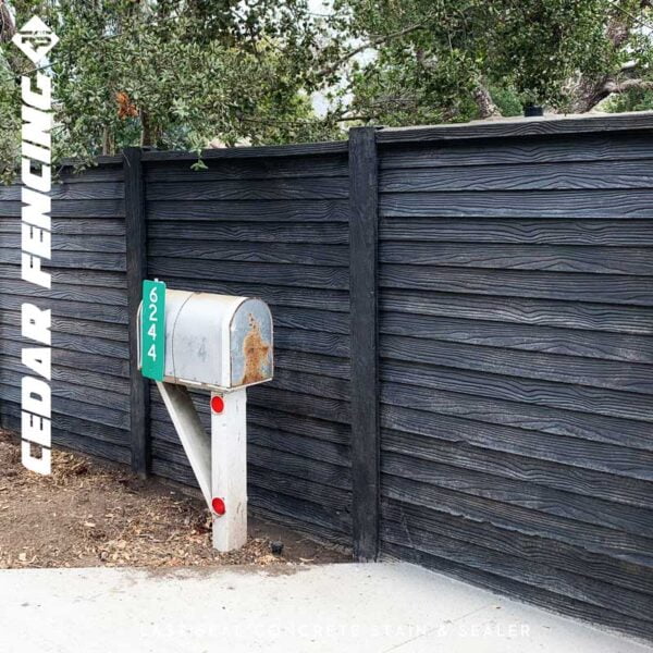 Customer Application::. LastiSeal Concrete Stain & Sealer (Dark Grey) applied to outdoor cedar fencing.