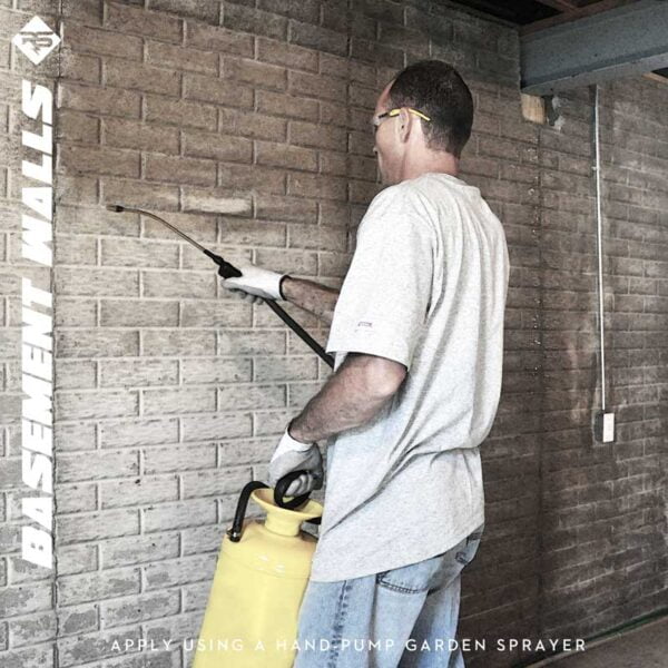 RadonSeal Deep-Penetrating Concrete Sealer being applied to a basement wall using a hand-pump garden sprayer.