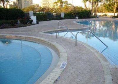 Before LastiSeal Concrete Stain and Sealer was applied to a hotel paver pool deck.