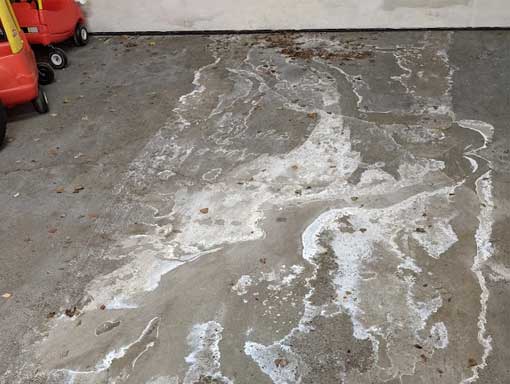 Efflorscence-Water-Garage-Floor Garage floor moisture